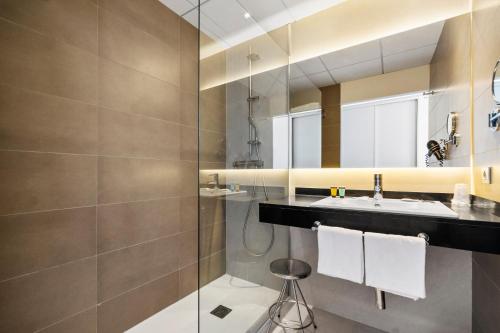 Habitación Triple Deluxe del hotel Areca. Foto 1