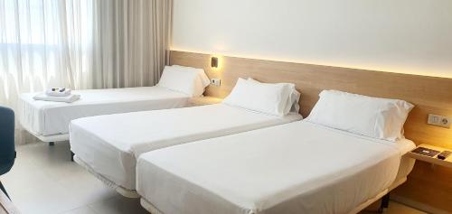 Habitación Triple Deluxe del hotel Areca. Foto 2
