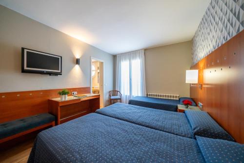 Habitación Triple del hotel J. Balmes Vic. Foto 1