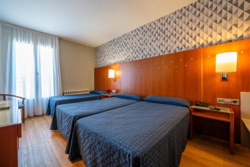 Habitación Triple del hotel J. Balmes Vic. Foto 3