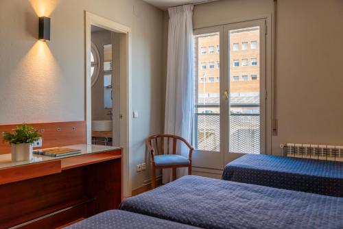 Habitación Triple del hotel J. Balmes Vic. Foto 4