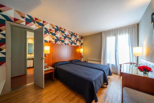 2 Habitaciones Dobles comunicadas del hotel J. Balmes Vic. Foto 1