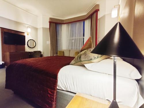 Habitación Triple del hotel Blue Bells. Foto 11