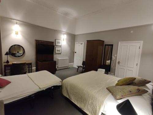 Habitación Triple del hotel Blue Bells. Foto 18