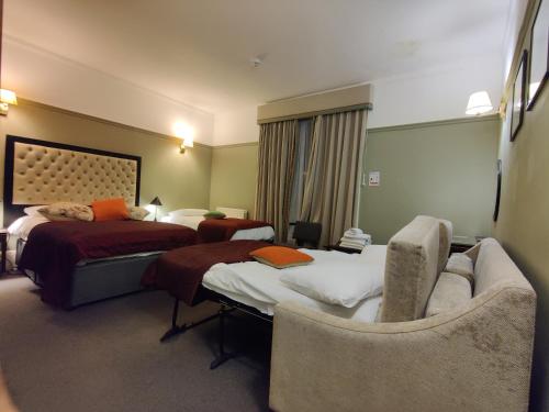 Habitación cuádruple del hotel Blue Bells. Foto 10