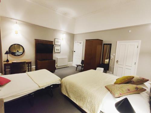 Habitación cuádruple del hotel Blue Bells. Foto 13