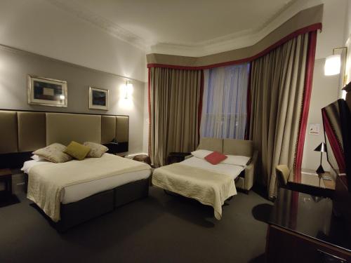 Habitación cuádruple del hotel Blue Bells. Foto 15