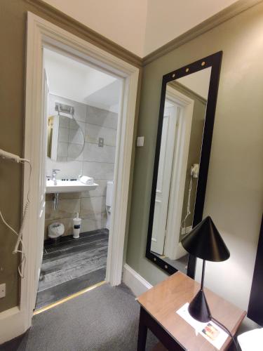 Habitación cuádruple del hotel Blue Bells. Foto 16