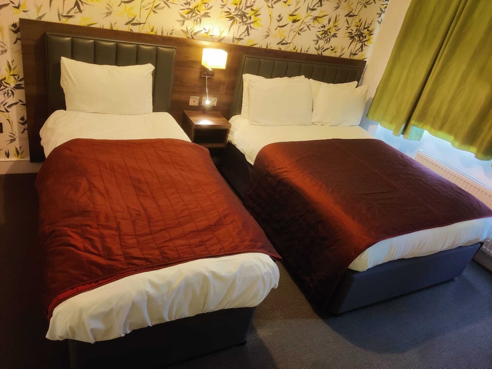 Habitación triple del hotel Chelsea House