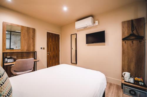 Habitación Doble sin ventana del hotel Euston Square. Foto 6