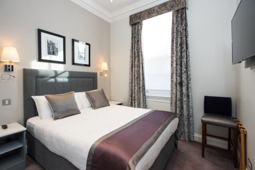 Suite con sofá cama y salón - Cama grande del hotel Best Western Victoria Palace. Foto 4