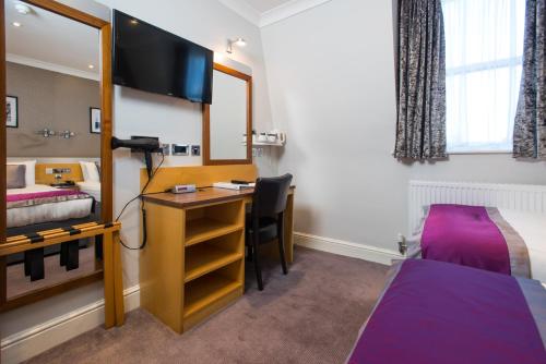 Habitación Cuádruple - Edificio anexo del hotel Best Western Victoria Palace. Foto 2