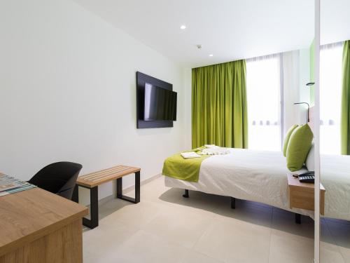 Habitación Doble Estándar del hotel MG Poniente. Foto 9