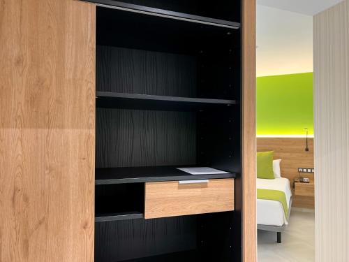 Habitación Deluxe - 1 cama grande del hotel MG Poniente. Foto 11