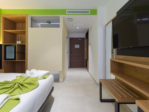 Habitación Doble Estándar del hotel MG Poniente. Foto 11