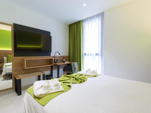 Habitación Doble Estándar del hotel MG Poniente. Foto 13