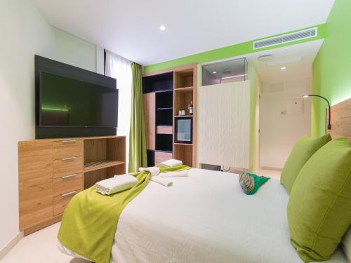 Habitación doble Vista ciudad 1 Cama doble del hotel MG Poniente. Foto 4