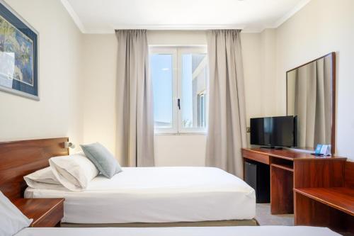Habitación Doble Económica del hotel Checkin Valencia Ciscar. Foto 5
