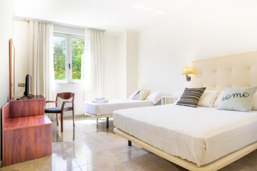 Habitación Triple Básica del hotel Checkin Valencia Ciscar