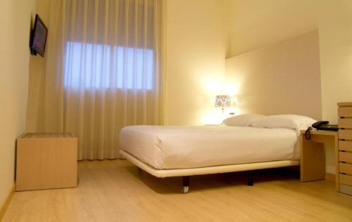 Habitación Individual del hotel Checkin Valencia Ciscar. Foto 3