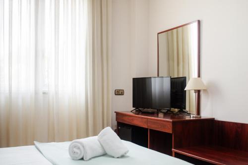Habitación Doble Económica del hotel Checkin Valencia Ciscar. Foto 2