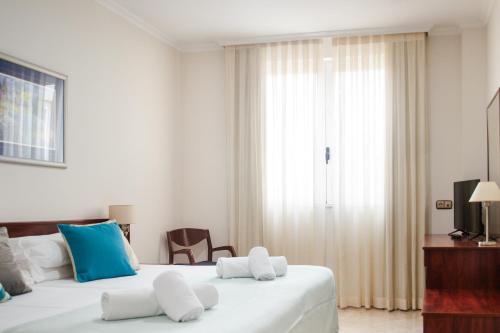 Habitación Doble Económica del hotel Checkin Valencia Ciscar. Foto 3