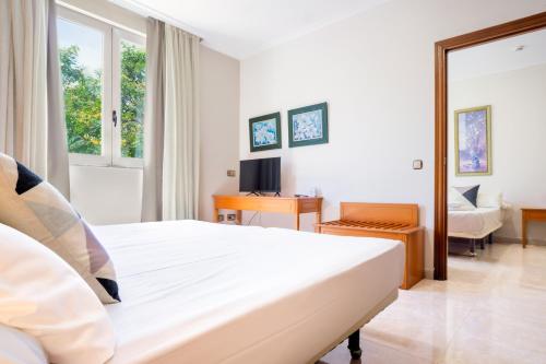 Habitación cuádruple económica del hotel Checkin Valencia Ciscar