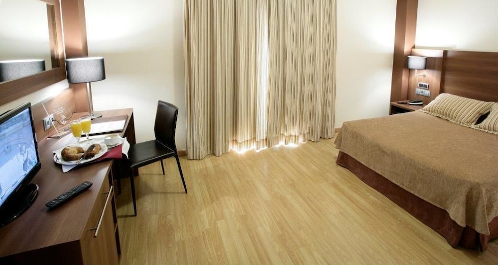 Habitación con 1 cama doble o 2 individuales del hotel Bs Capitulaciones. Foto 3