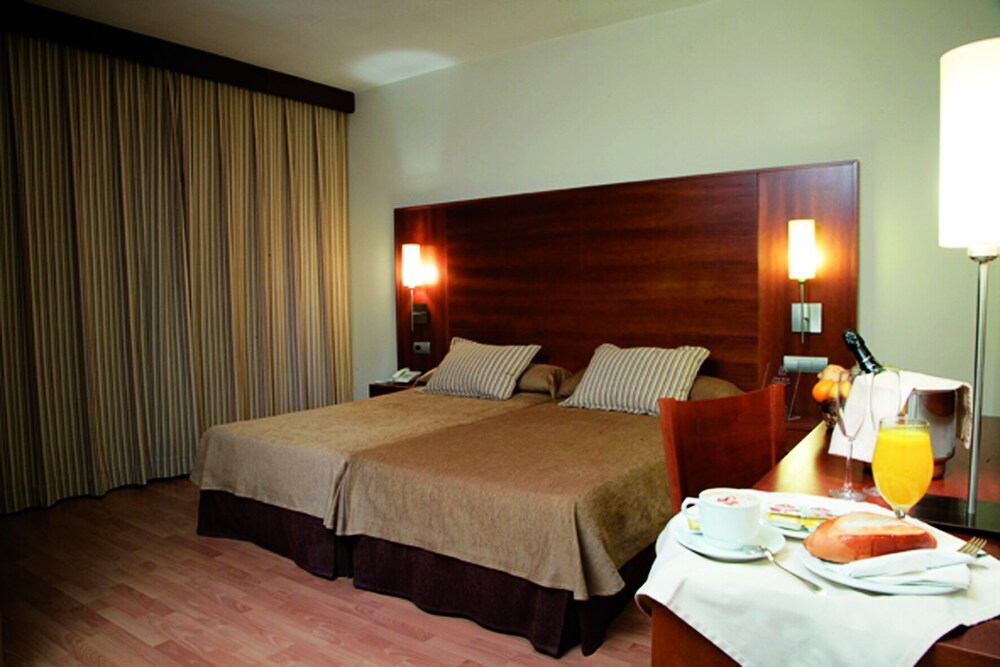 Habitación individual del hotel Bs Capitulaciones