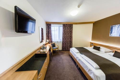 Habitación Doble con vistas a la ciudad - 1 o 2 camas del hotel Archibald City. Foto 2