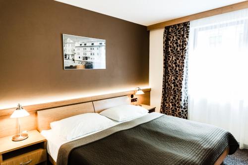 Habitación Doble con vistas a la ciudad - 1 o 2 camas del hotel Archibald City. Foto 6