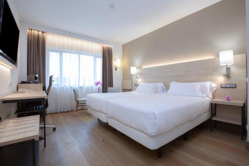 Suite Junior Habitación Familiar del hotel Puerta De Bilbao. Foto 2