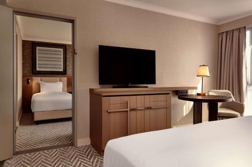 Habitación Familiar comunicada - Cama extragrande y 2 camas individuales del hotel Hilton Vienna Park