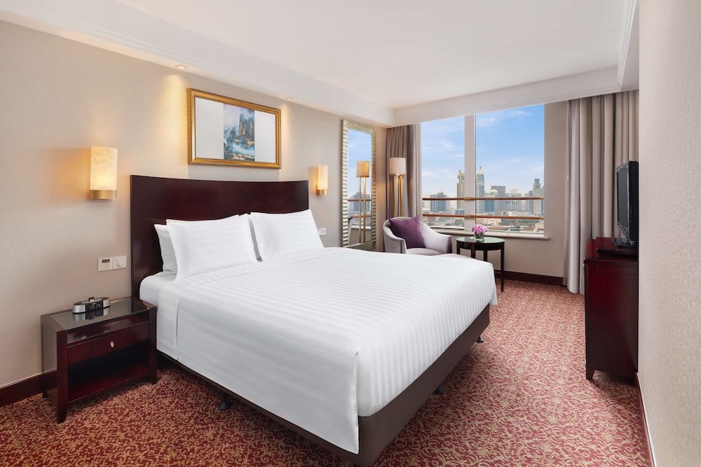 Suite Junior del hotel Radisson Blu Shanghai New World. Foto 1
