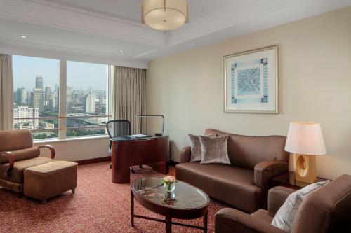 Suite Deluxe del hotel Radisson Blu Shanghai New World. Foto 1