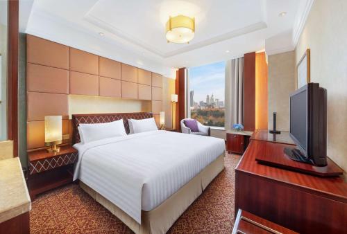 Suite Deluxe del hotel Radisson Blu Shanghai New World. Foto 2