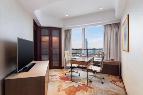 Suite Junior del hotel Radisson Blu Shanghai New World