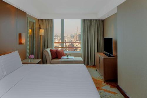 Suite Junior clase Business del hotel Radisson Blu Shanghai New World. Foto 1
