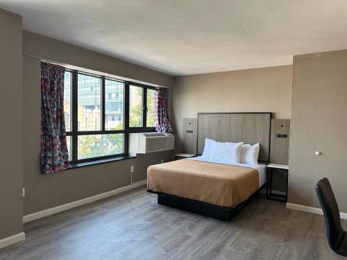 Suite Deluxe Queen del hotel Regal Inn and Suites New York LaGuardia. Foto 12