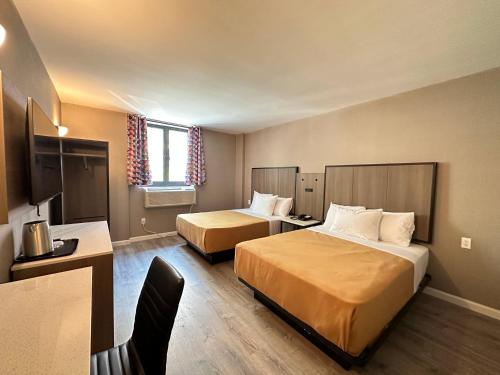 Habitación Doble Estándar del hotel Regal Inn and Suites New York LaGuardia. Foto 8