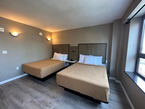 Habitación Doble Estándar del hotel Regal Inn and Suites New York LaGuardia. Foto 9