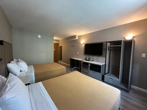 Habitación Doble Estándar del hotel Regal Inn and Suites New York LaGuardia. Foto 10