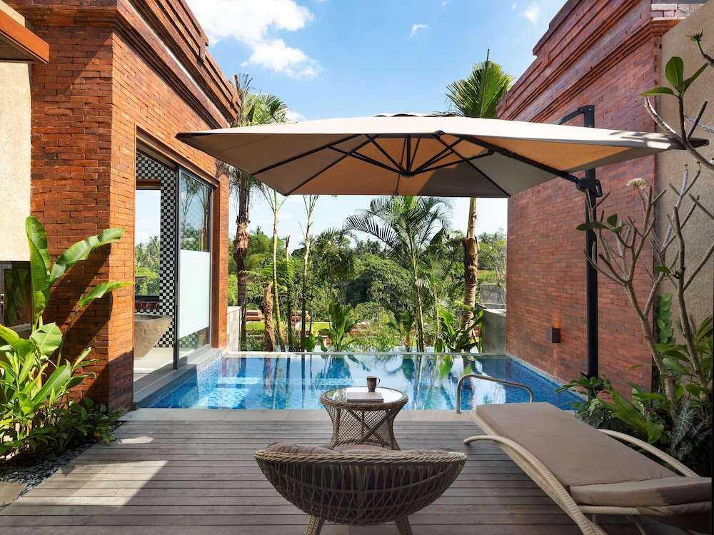 Villa con Vistas a la Piscina del hotel Garrya Bianti Yogyakarta. Foto 5