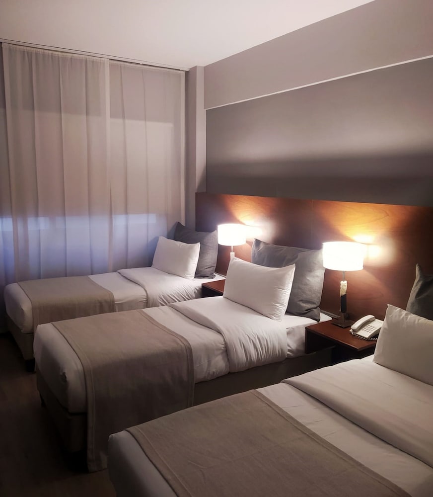 Habitación Triple Estándar del hotel Rochester Concept. Foto 1