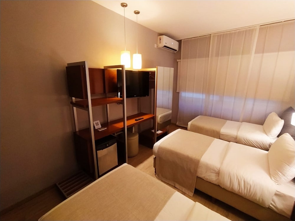 Habitación Triple Estándar del hotel Rochester Concept. Foto 3