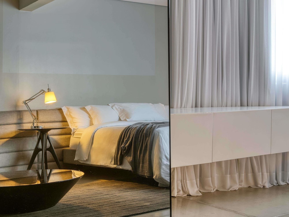 Suite junior, 1 cama de matrimonio grande del hotel Mercure Belo Horizonte Vila Da Serra. Foto 8