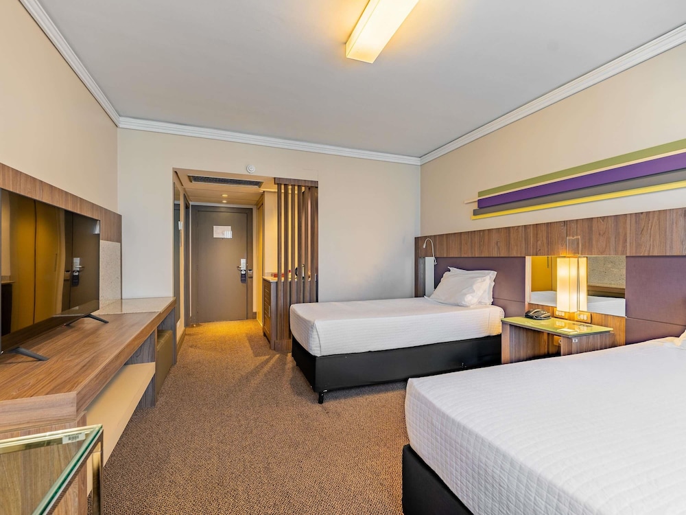 Habitación superior con 2 camas individuales del hotel Grand Mercure Curitiba Rayon. Foto 7