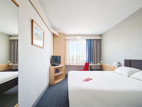 Habitación Estandar del hotel Ibis Czestochowa. Foto 5