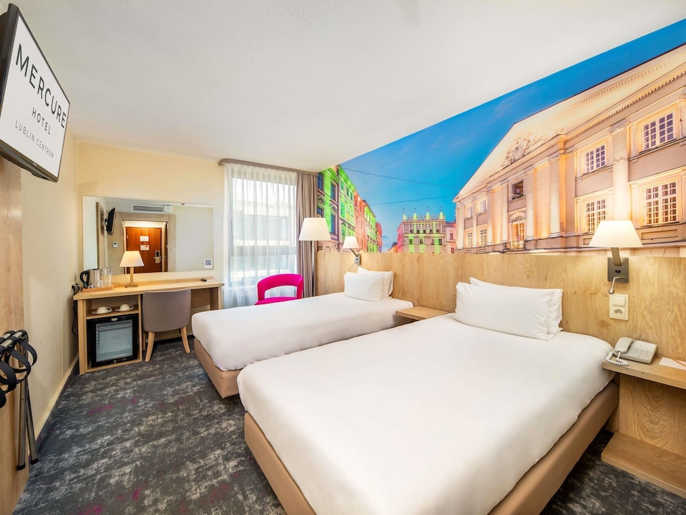 Habitación clásica con dos camas individuales separadas del hotel Mercure Lublin Centrum. Foto 1