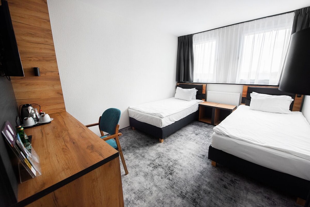 Habitación Superior con Dos Camas Individuales del hotel Mercure Opole. Foto 2